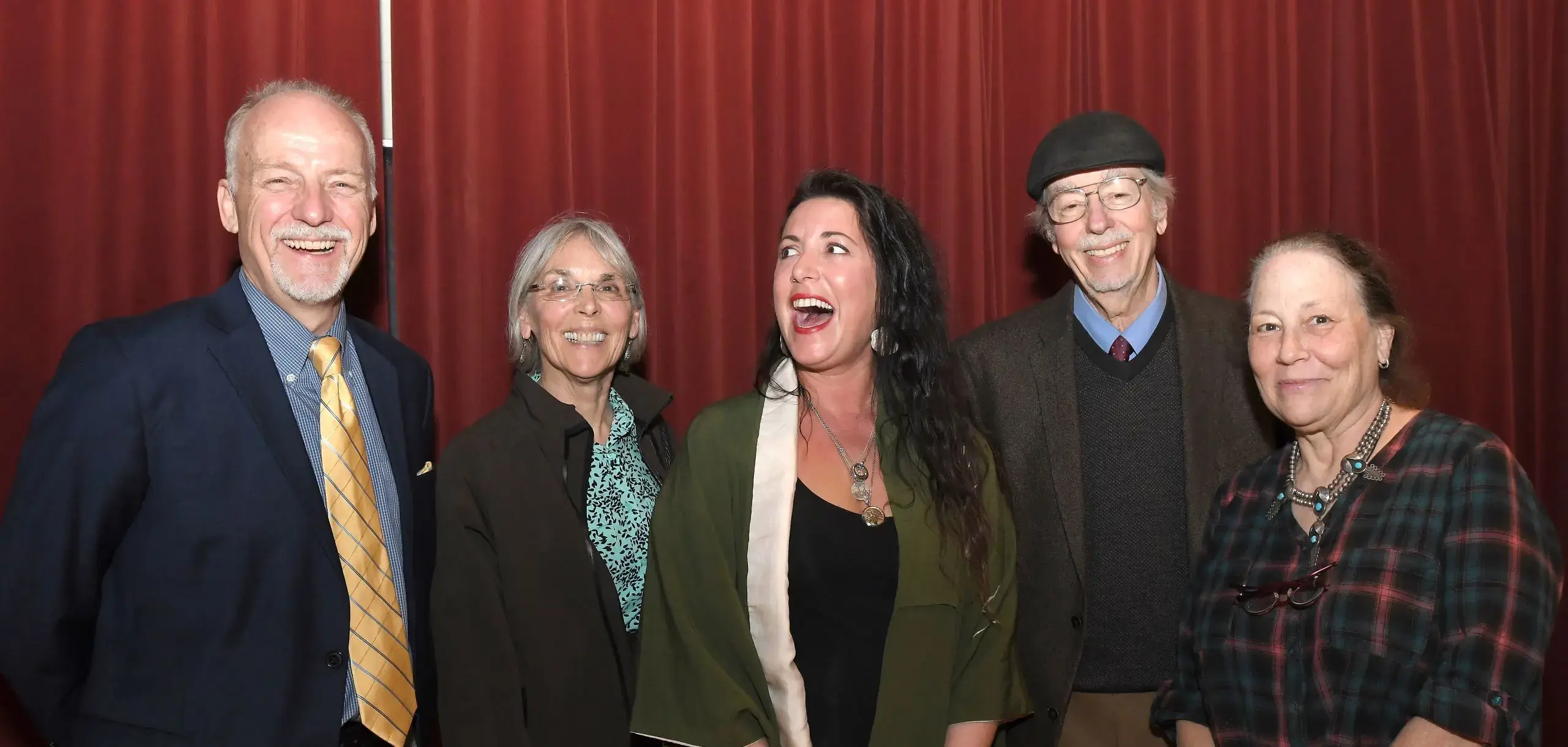 Alumni Arts Hall of Fame award recipients smiling for a group photograph.