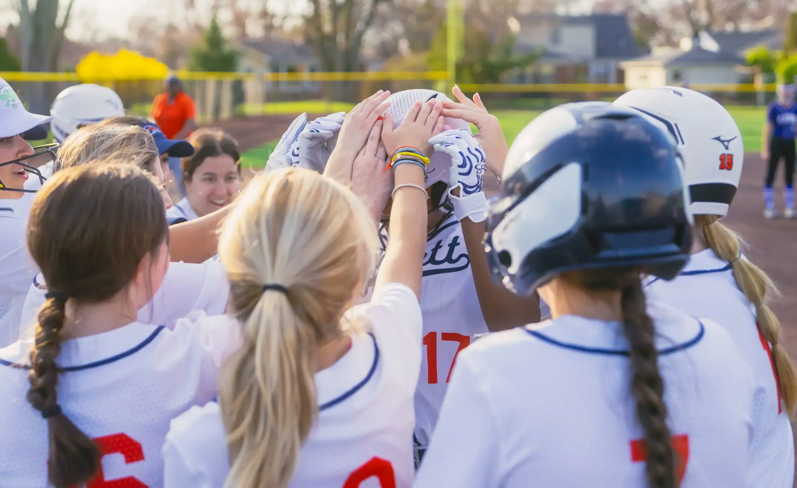 Girls softball team gives each other high fives
