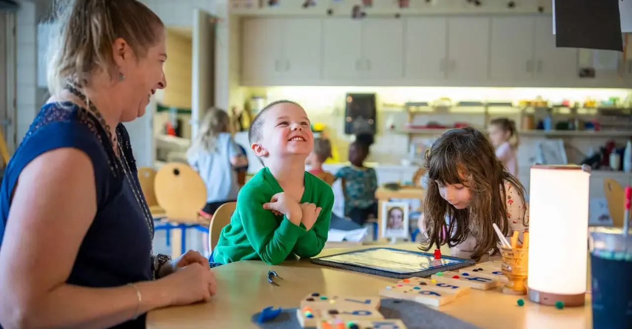  Child celebrates teacher