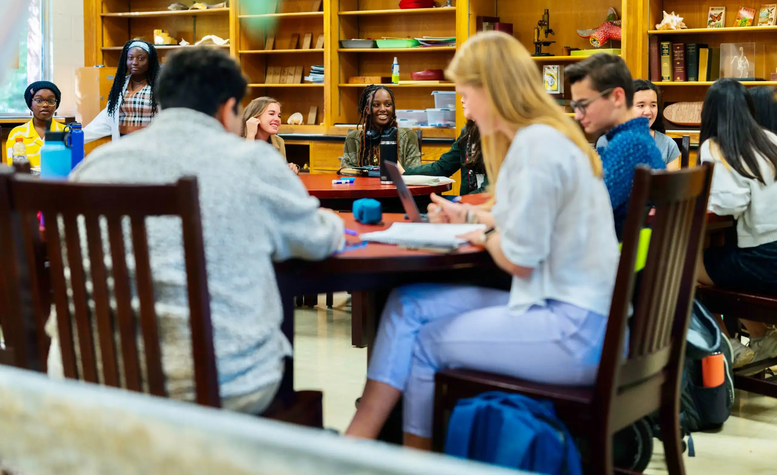 Upper school, high school classroom, engaged students
